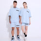 Stylera retro blue oversized t-shirt and matching shorts on male and female models for casual streetwear