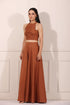 Model wearing a rust brown crop top and palazzo set, showcasing a stylish and elegant look