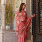 Elegant rust saree with floral hand painting, perfect for festive occasions and traditional events.