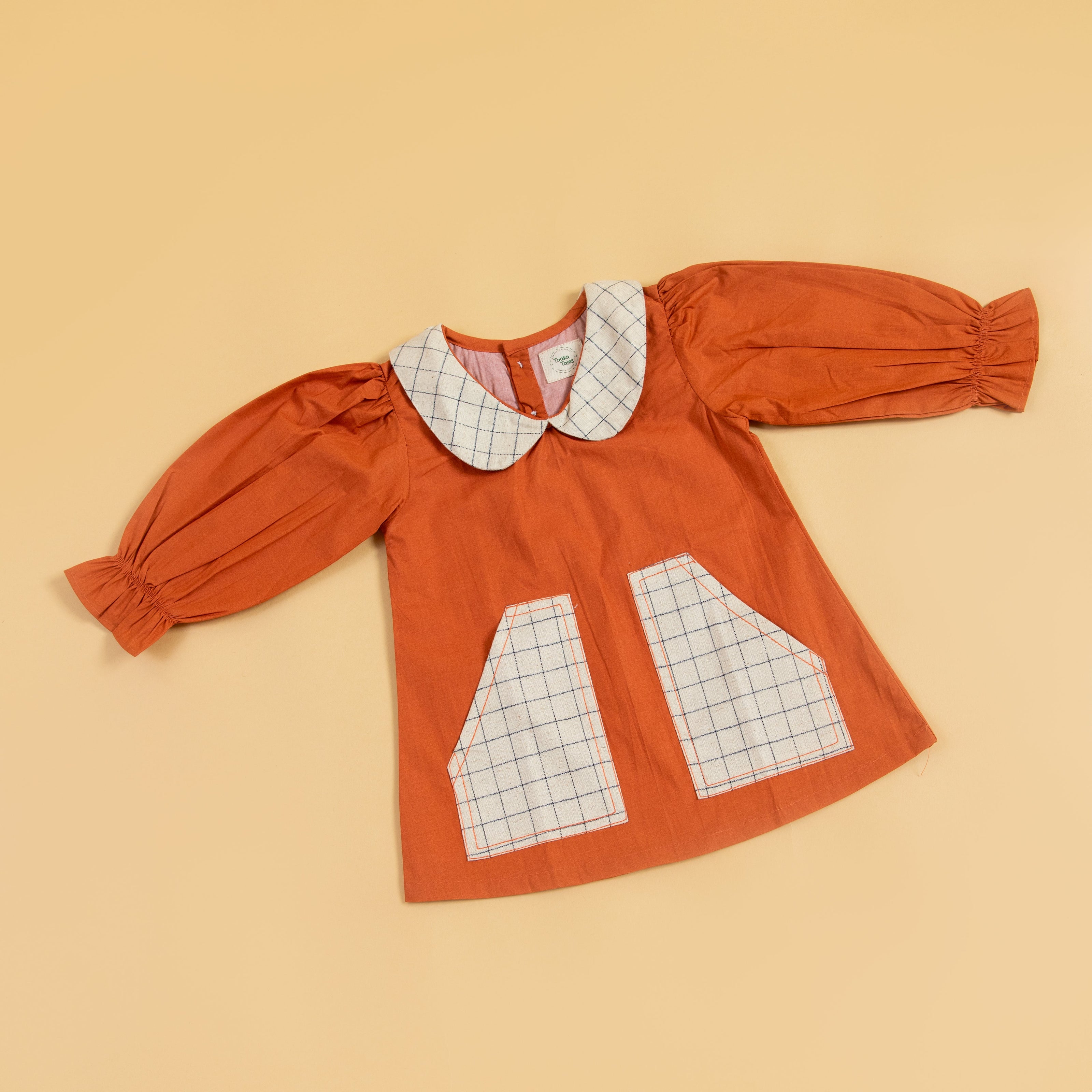 Stylera Rustic Dress for Fall Outings in Orange with Decorative Collared Neckline and Pockets