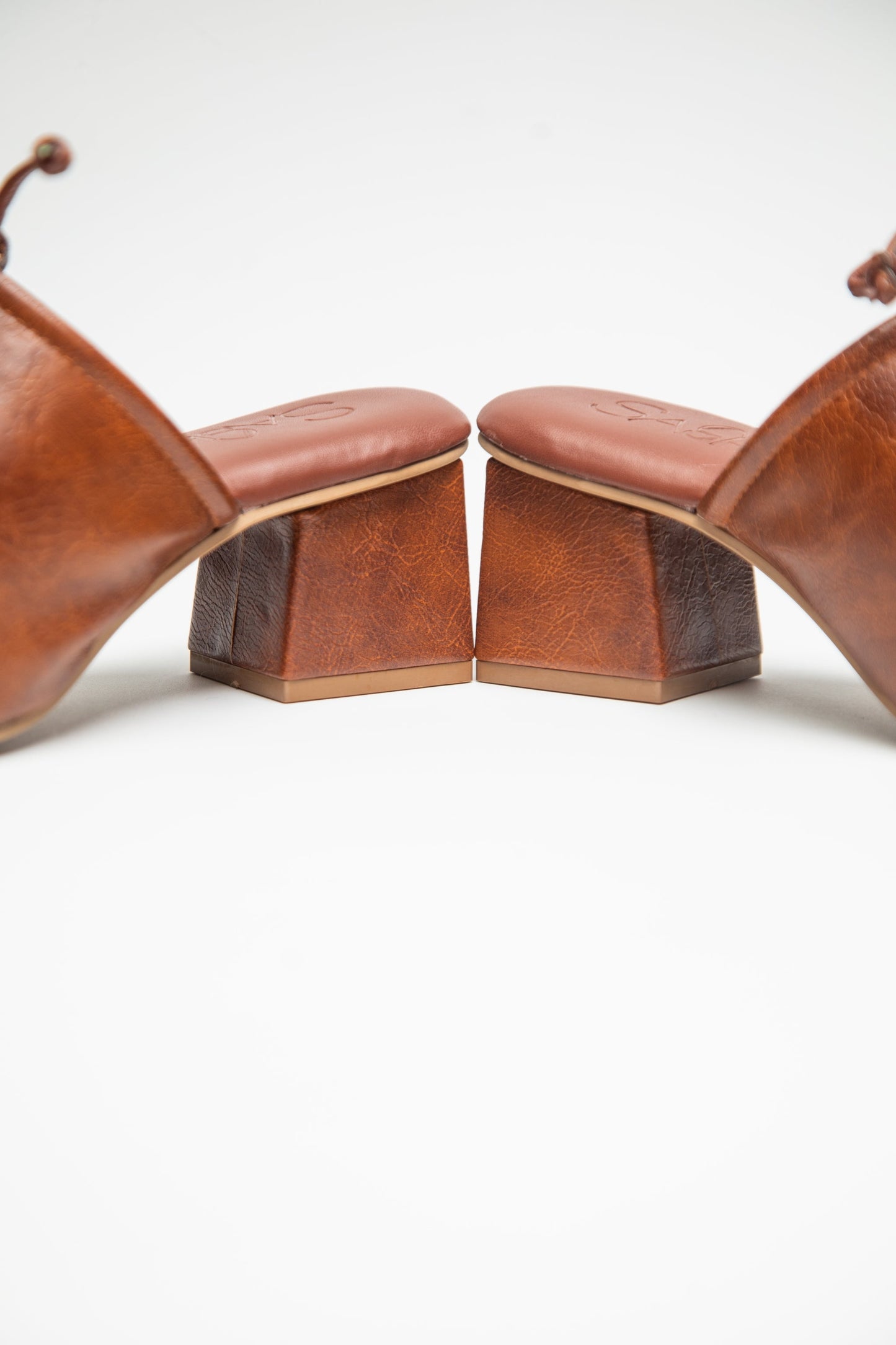 stylera brown slip-on block heel shoes with a textured leather finish and comfortable padded insole