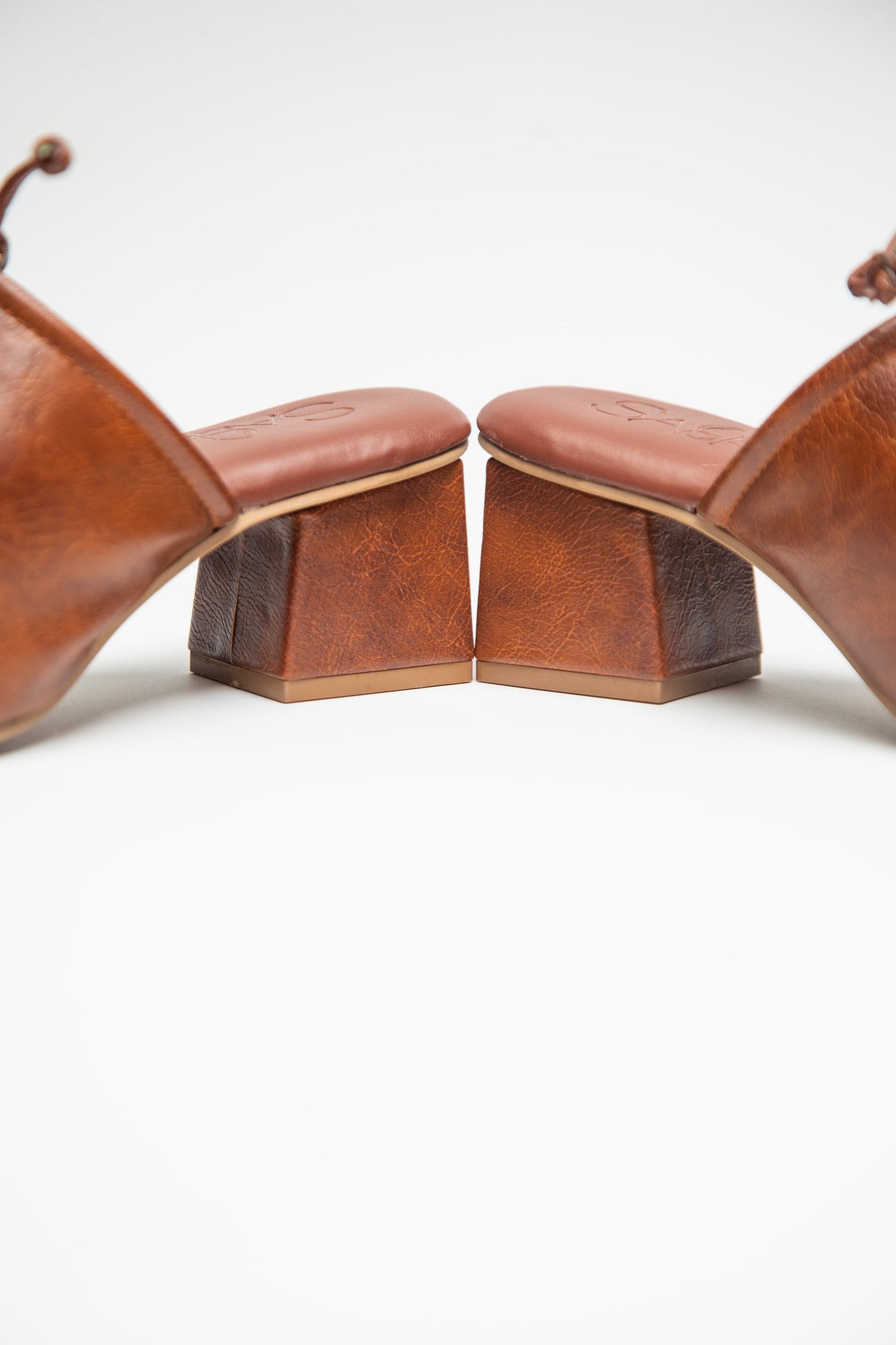 stylera brown slip-on block heel shoes with a textured leather finish and comfortable padded insole