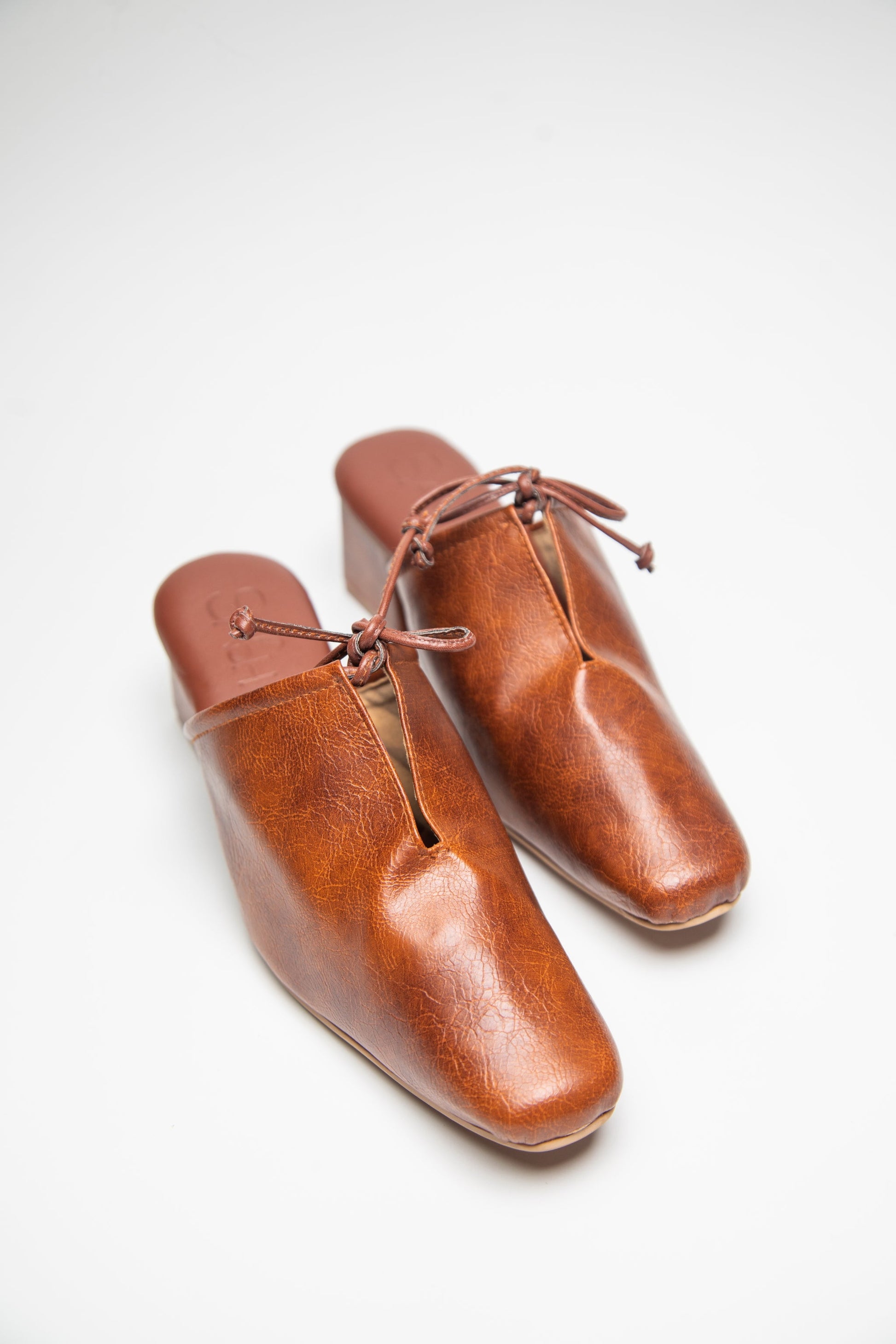 stylera brown slip-on block heel shoes with square toe and decorative lace detail