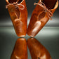 stylera brown slip-on block heel shoes with leather upper and decorative bow detail