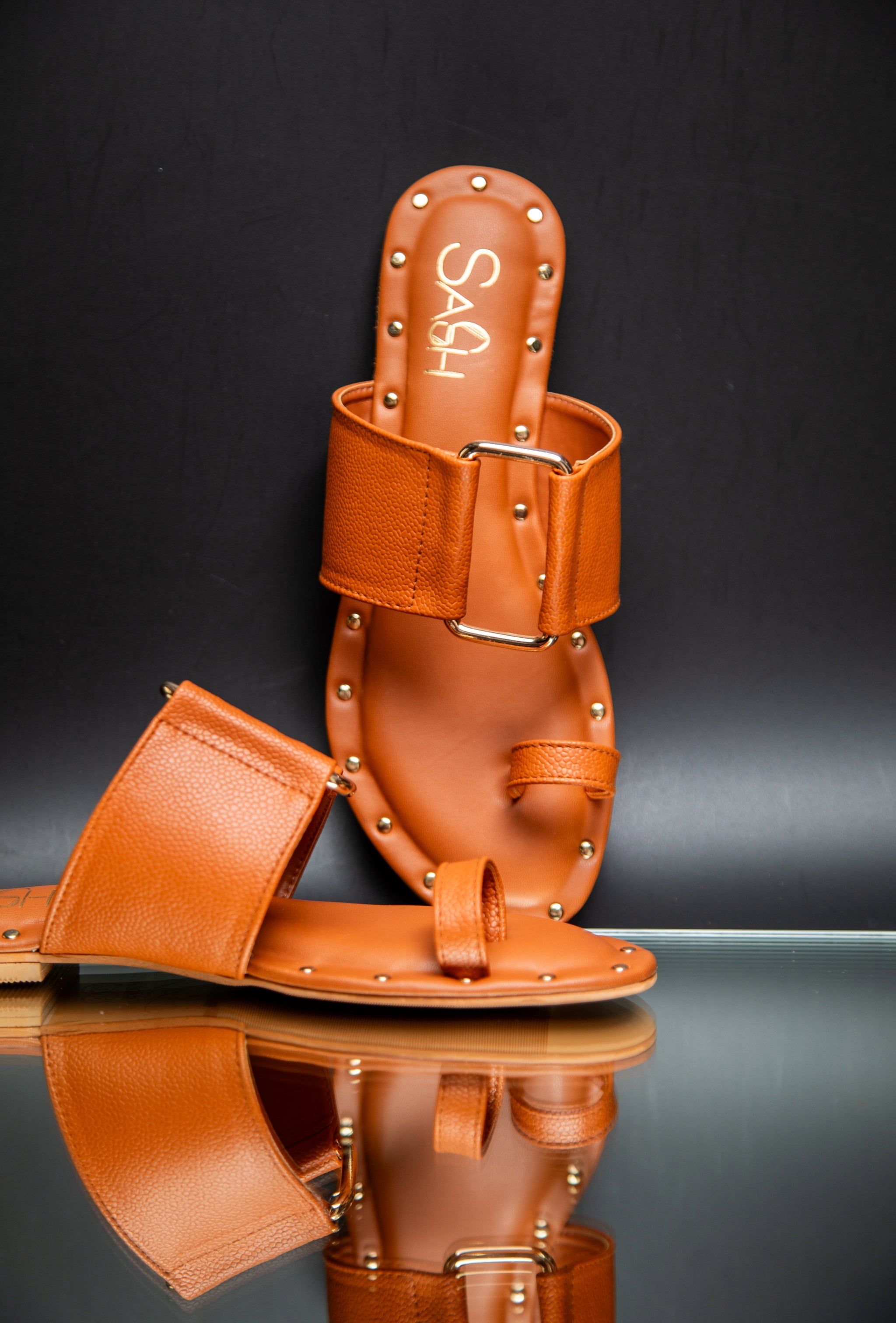 Stylera trendy leather flats for women in tan with studded details and buckle strap