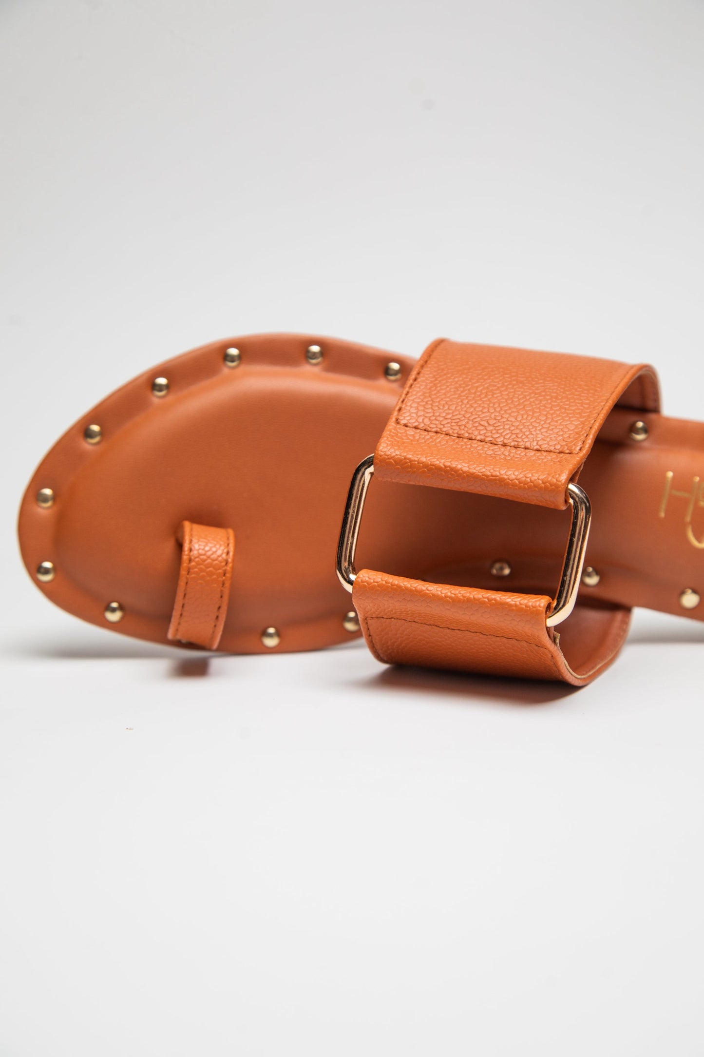Stylera trendy leather flats for women in tan with studded sole and wide buckle strap