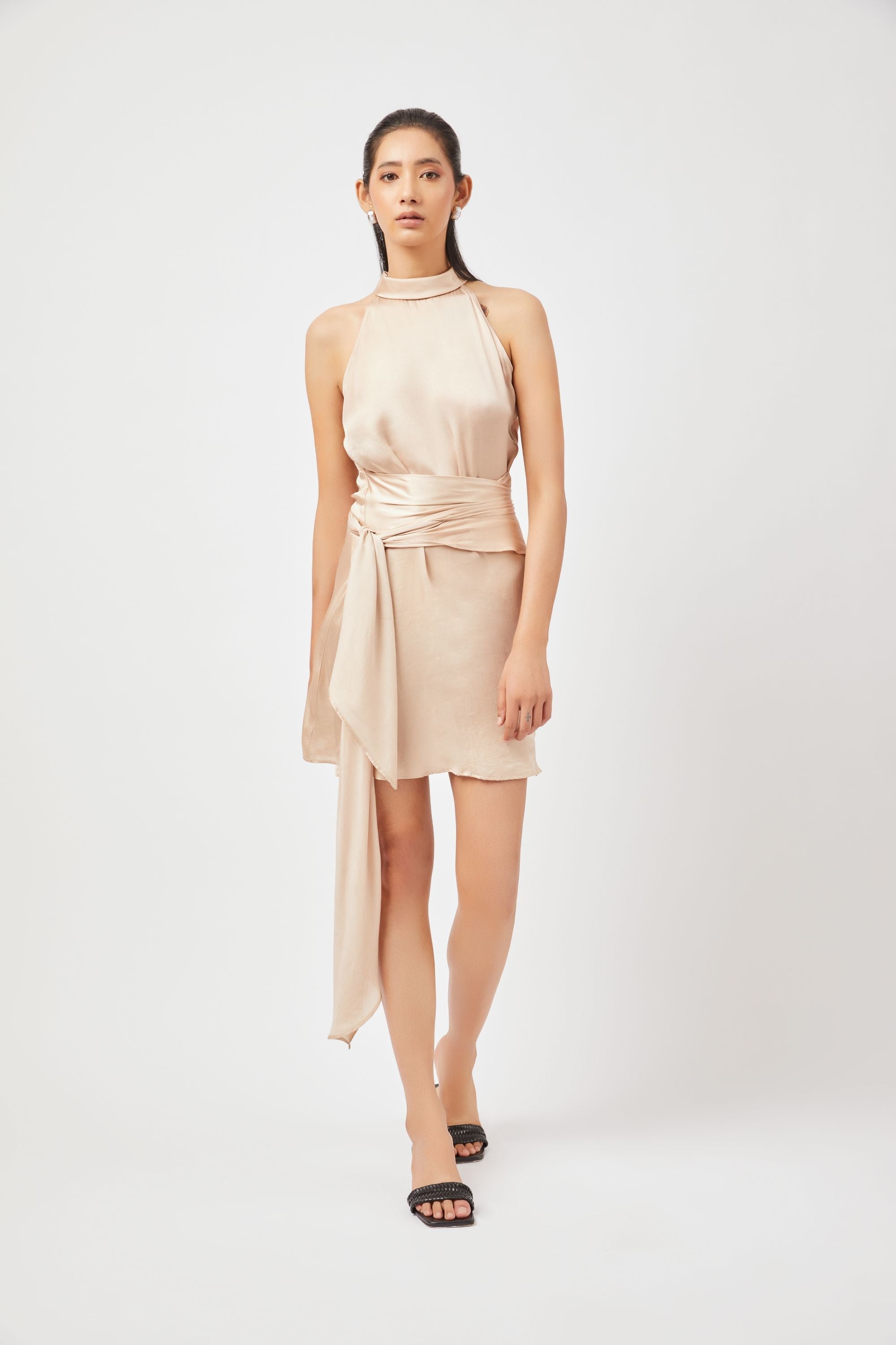 Stylera satin halter mini dress in beige with waist tie and sleeveless design