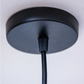 Sozori sculpted white hanging lamp with a sleek black ceiling mount for modern decor