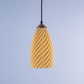Sculpted white hanging lamp with a modern twisted design for stylish illumination