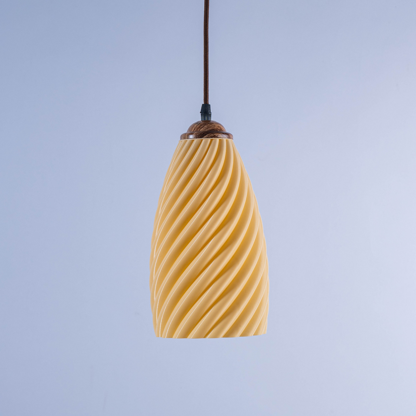 Sculpted white hanging lamp with a modern twisted design for stylish illumination