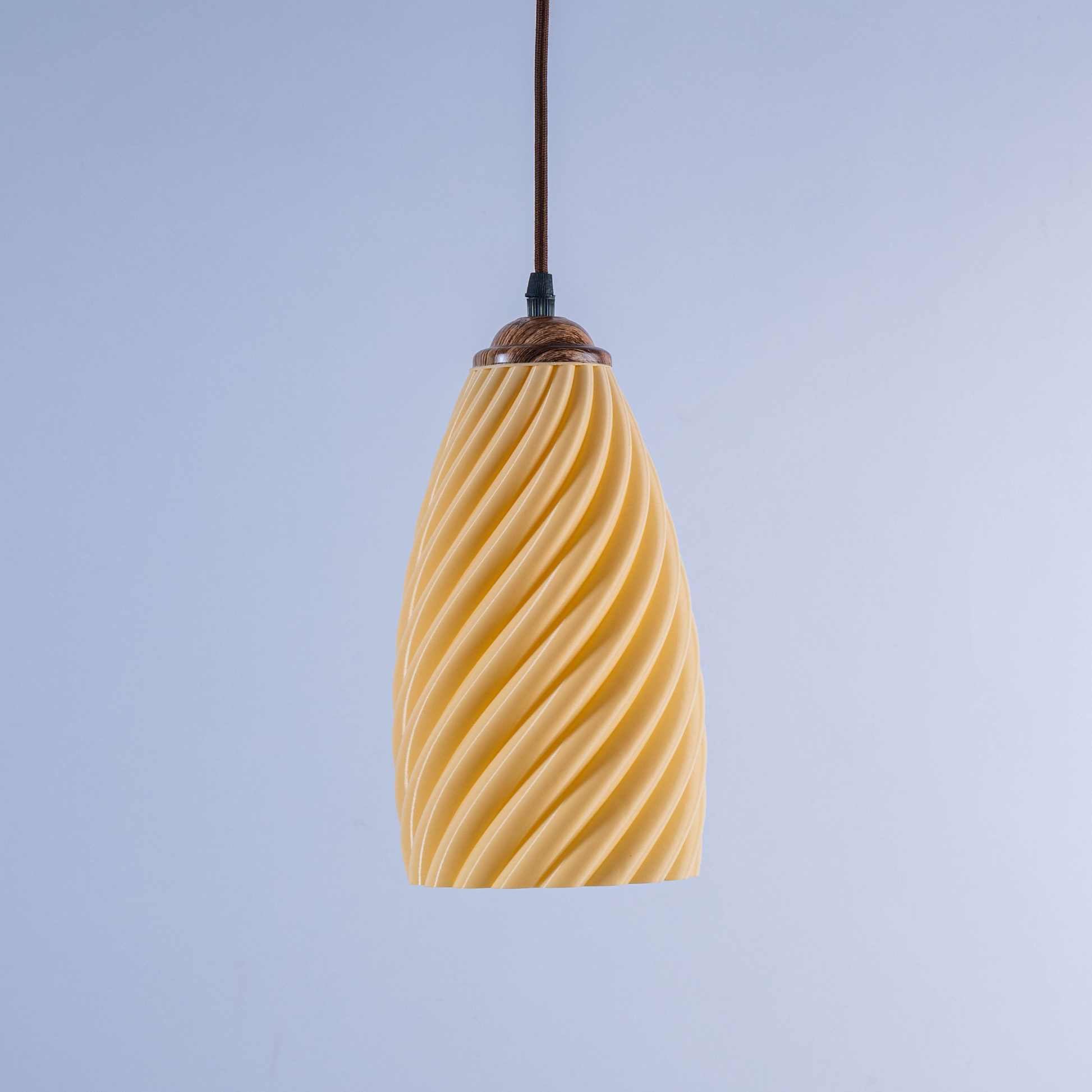 Sculpted white hanging lamp with a modern twisted design for stylish illumination