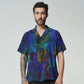 Stylera short sleeve artistic button up shirt featuring a vibrant abstract pattern in blue and green