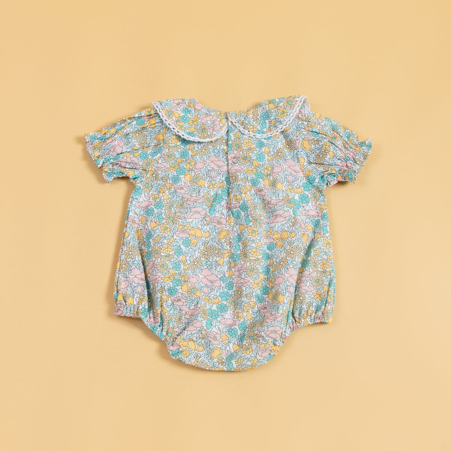 Floral short sleeve baby romper with a lace collar design for stylish infants