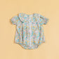 Floral Stylera short sleeve baby romper with a cute collar and button detailing