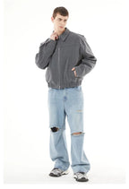 Side profile of sky blue baggy jeans showing the wide leg fit and mid-rise waist.