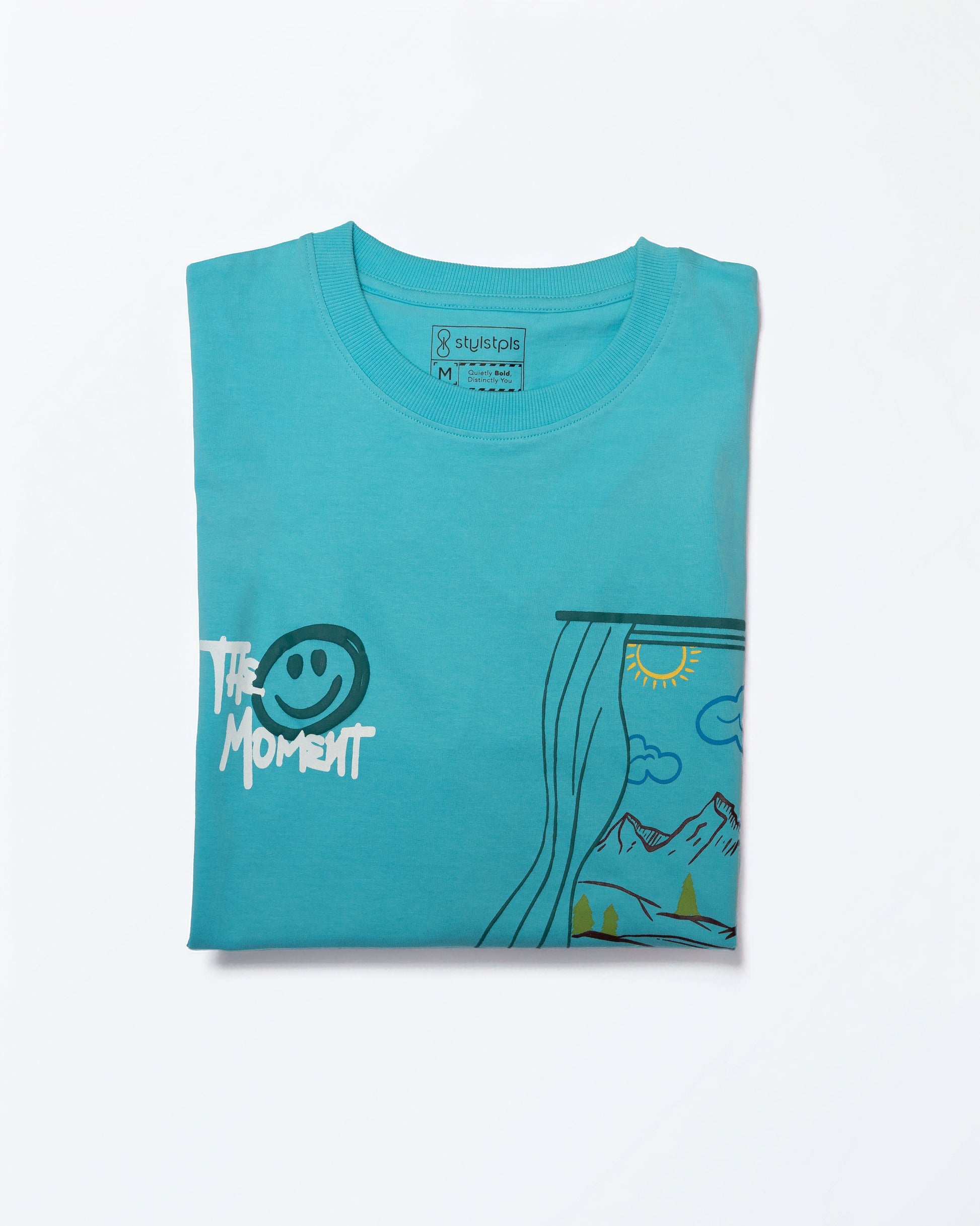 Stylstpls sky blue oversized t-shirt featuring a fun graphic design and relaxed fit