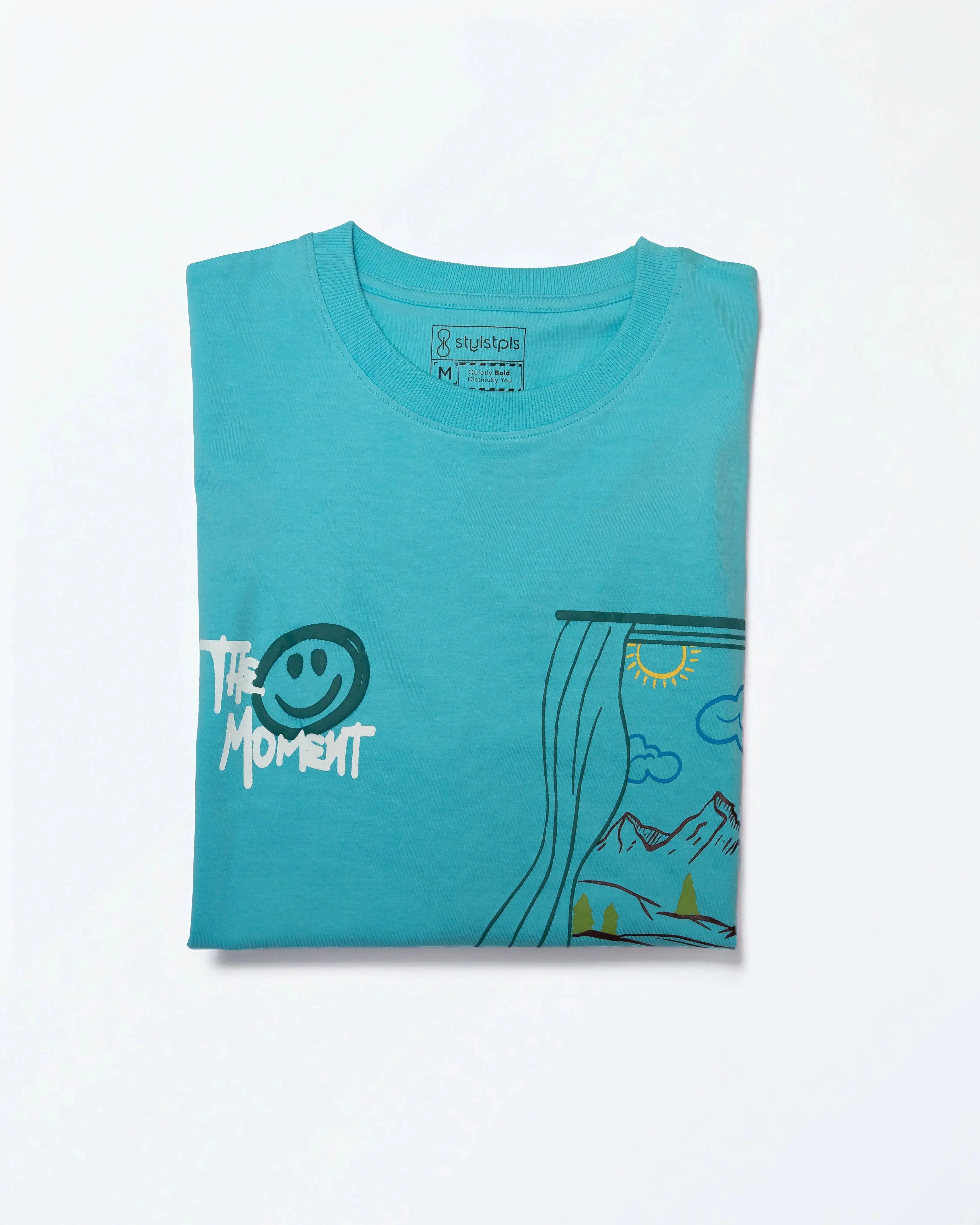 Stylstpls sky blue oversized t-shirt featuring a fun graphic design and relaxed fit