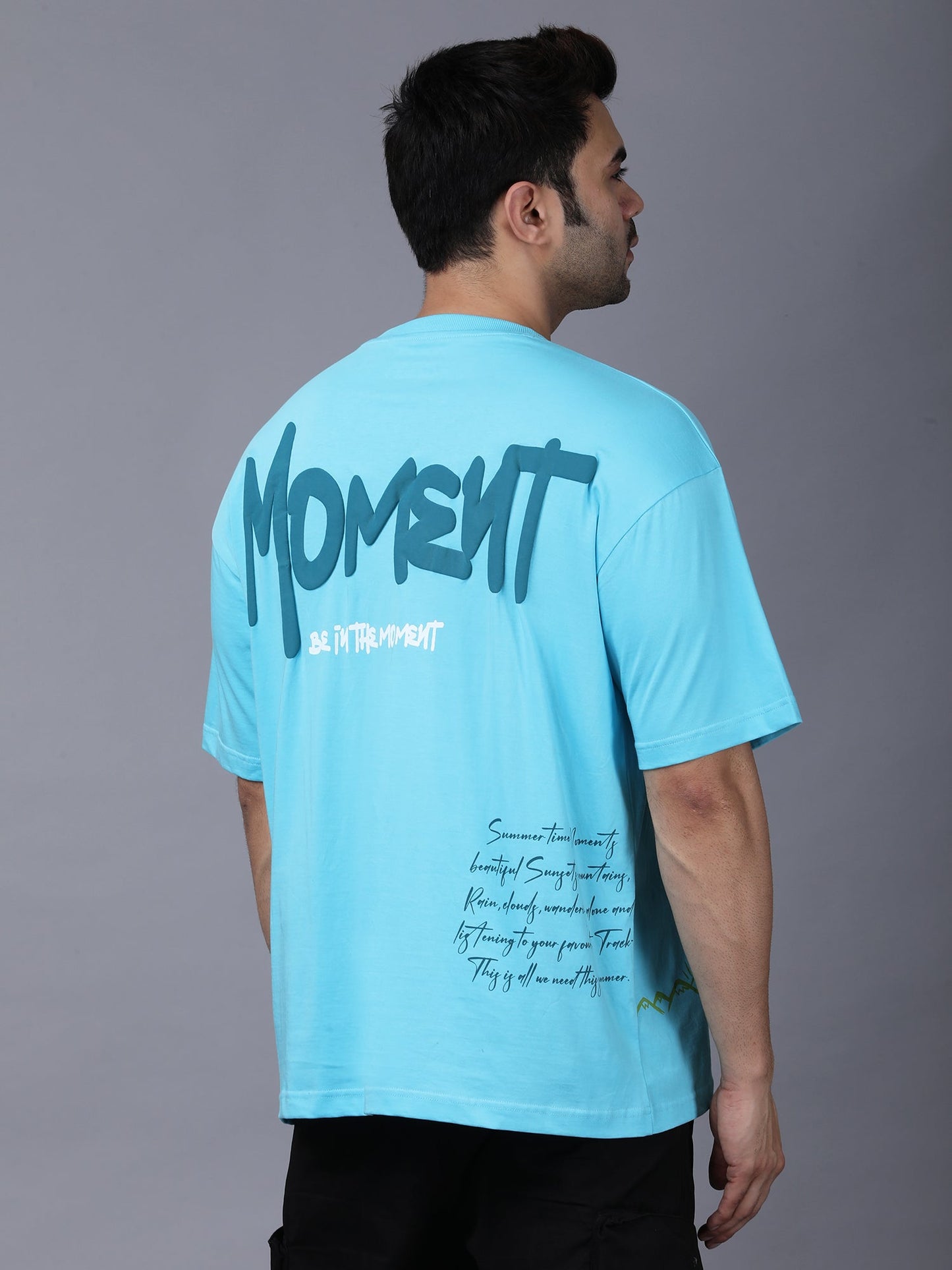 Stylstpls sky blue oversized t-shirt featuring bold graphics and a relaxed fit for casual style