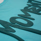 Stylstpls sky blue oversized t-shirt featuring bold graphic design on the front