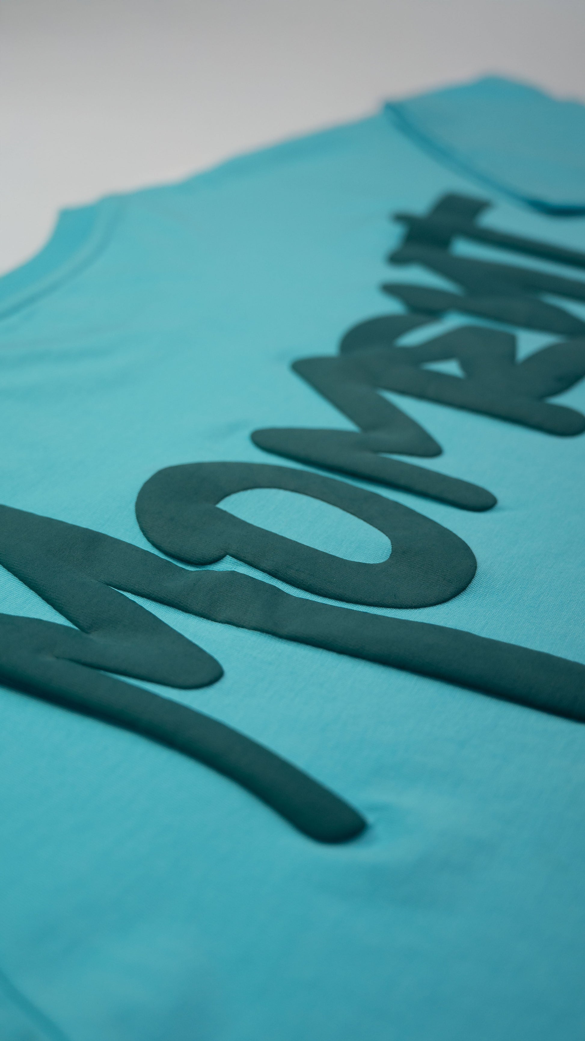 Stylstpls sky blue oversized t-shirt featuring bold graphic design on the front