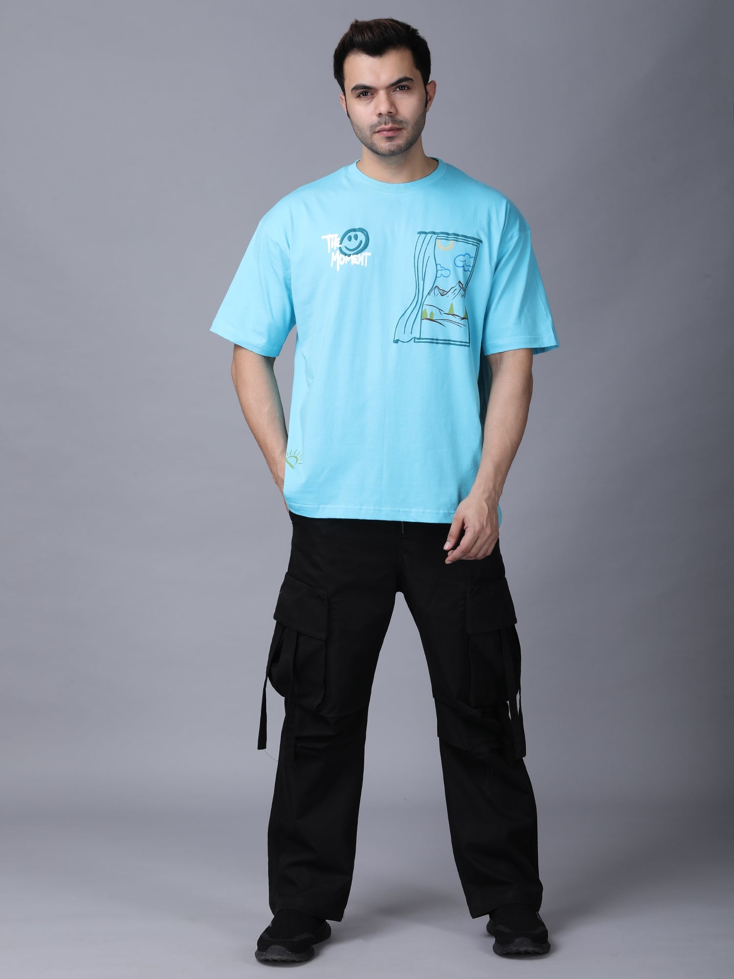 Stylstpls sky blue oversized t-shirt with graphic print and relaxed fit for casual style
