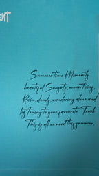 Stylstpls sky blue oversized t-shirt featuring a stylish summer quote in black text