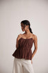 Stylera sleeveless peplum blouse for women in brown with ruched bodice and thin straps