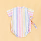 Soft cotton kimono romper for babies in pastel stripes with a tie closure on the back