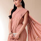 Elegant soft cotton saree with floral design, styled with accessories for a sophisticated look