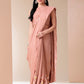 Elegant Stylera soft cotton saree with floral design in pastel pink, perfect for festive occasions
