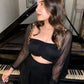 Stylish solid black two piece outfit women featuring a cropped top and skirt, perfect for a chic evening look.