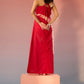 Stylera red bandhani tie dye dress with halter neck and back detail on model