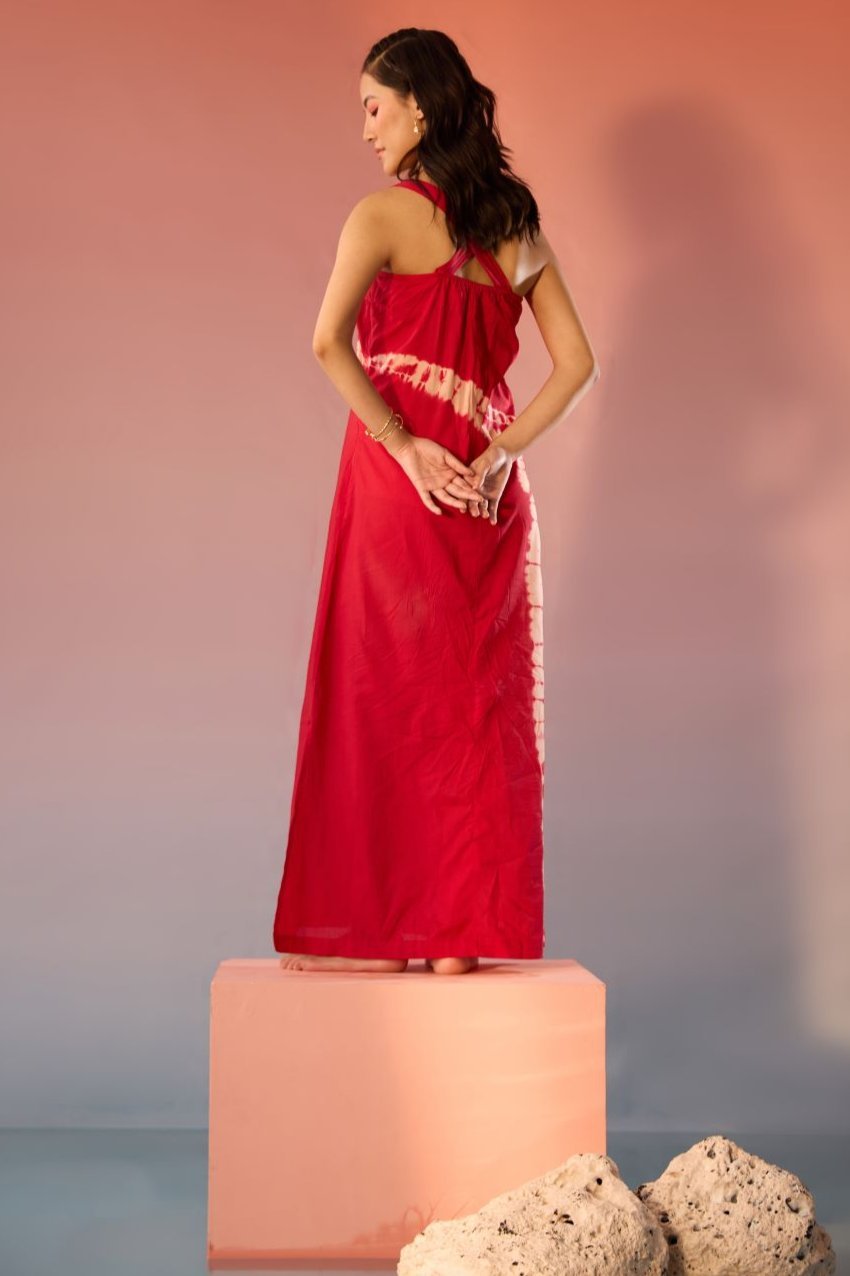 Stylera red bandhani tie dye dress with halter neck and back detail on model