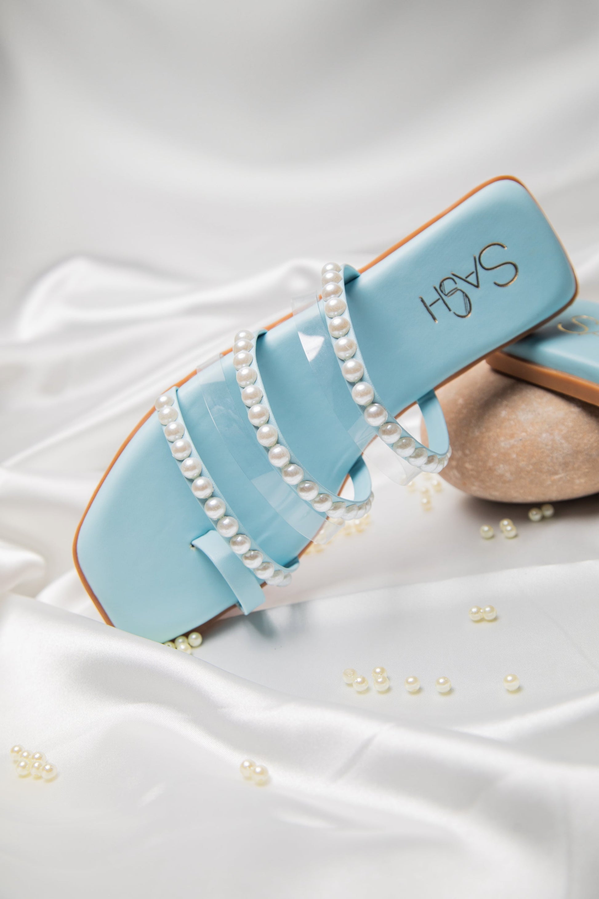 Stylera blue pearl strap sandals with glossy blue finish and pearl embellishments