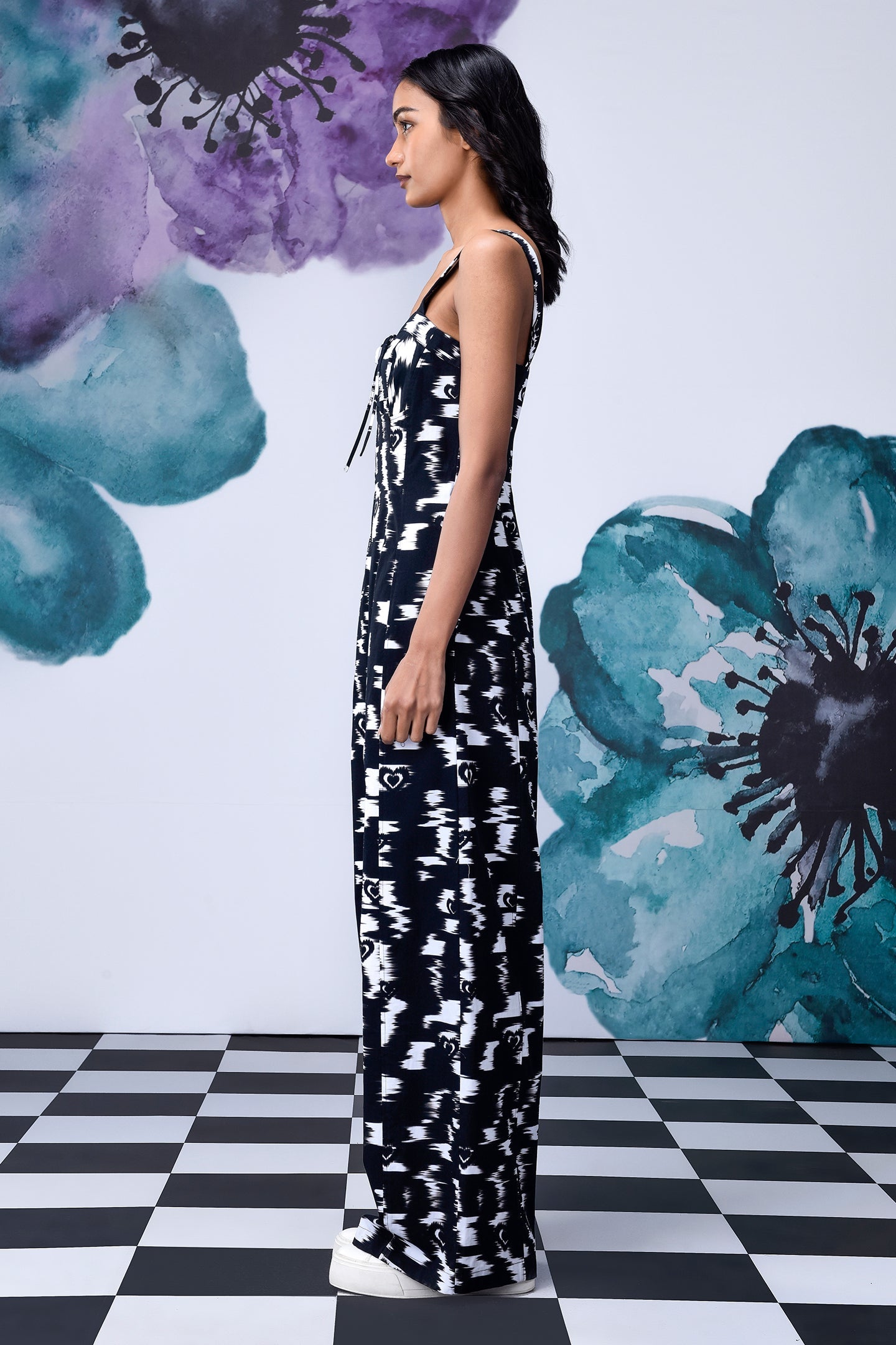Stylera black and white printed wide leg dungaree side view on model stylish casual dungarees for women