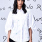 Model wearing Stylera white button down stylish casual embroidered top with puff sleeves and collar