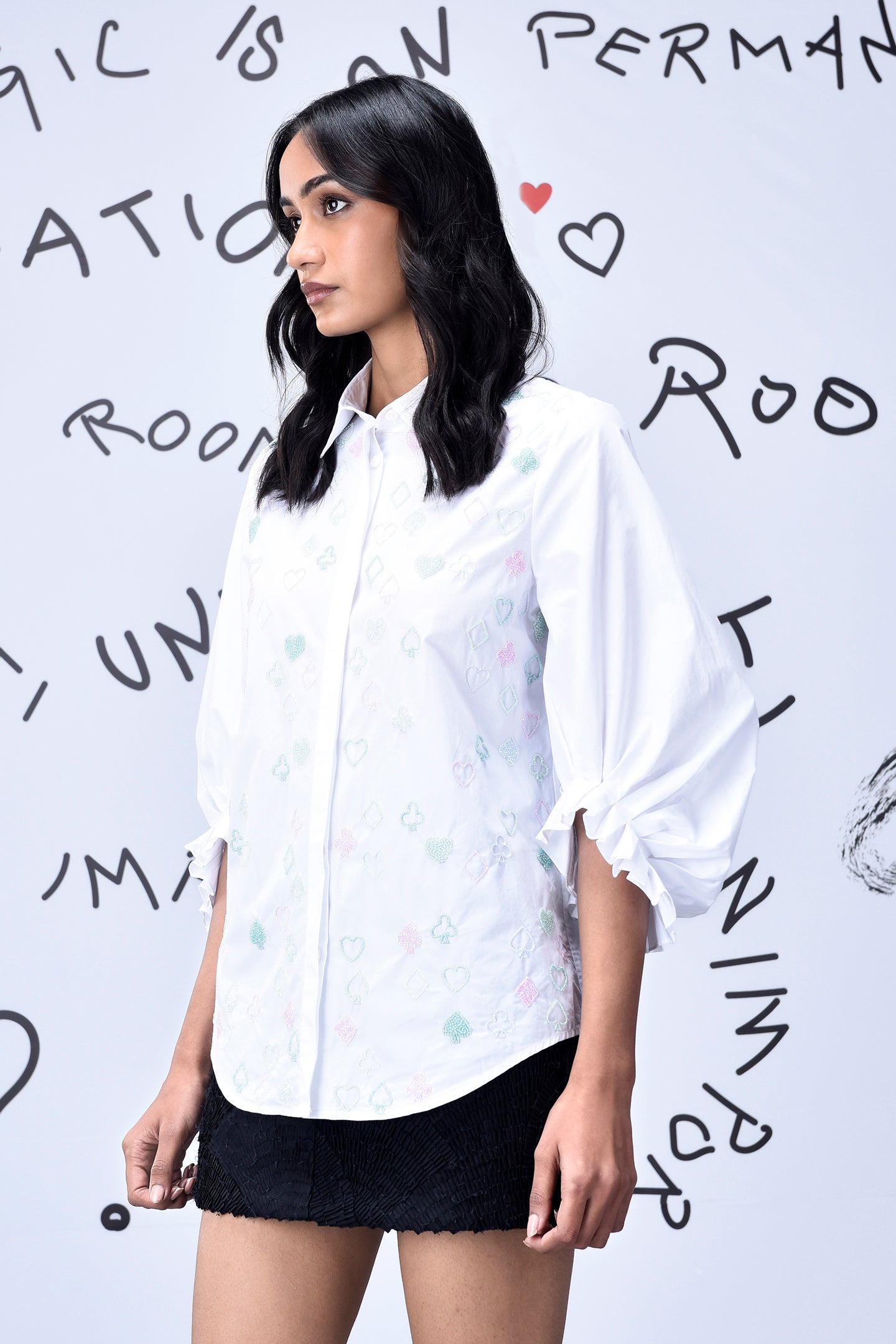 Model wearing Stylera stylish casual embroidered top white button down with puff sleeves