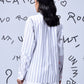 Stylera white and gray striped long sleeve shirt back view on model stylish casual shirts for women