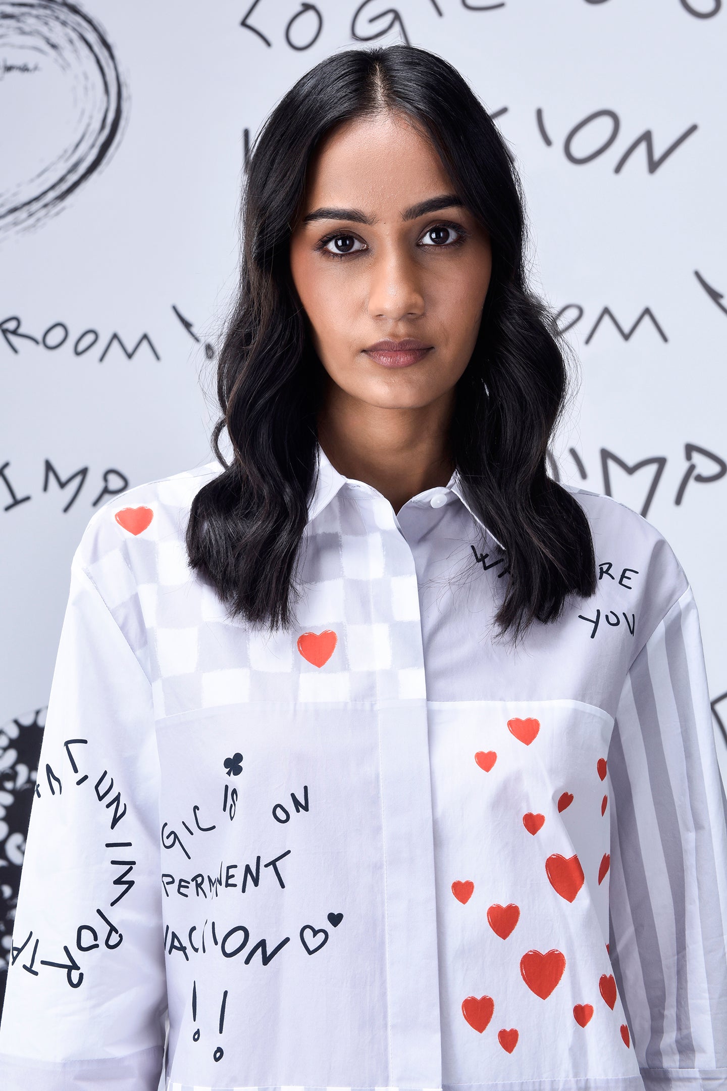 Stylera white button down shirt with red heart print and handwritten text on model stylish casual shirts for women