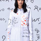 Stylera white button down shirt with red heart print and graffiti text on model stylish casual shirts for women