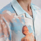 Stylera pastel sky print shirt with classical statue motif and camp collar stylish casual vacation shirts for men