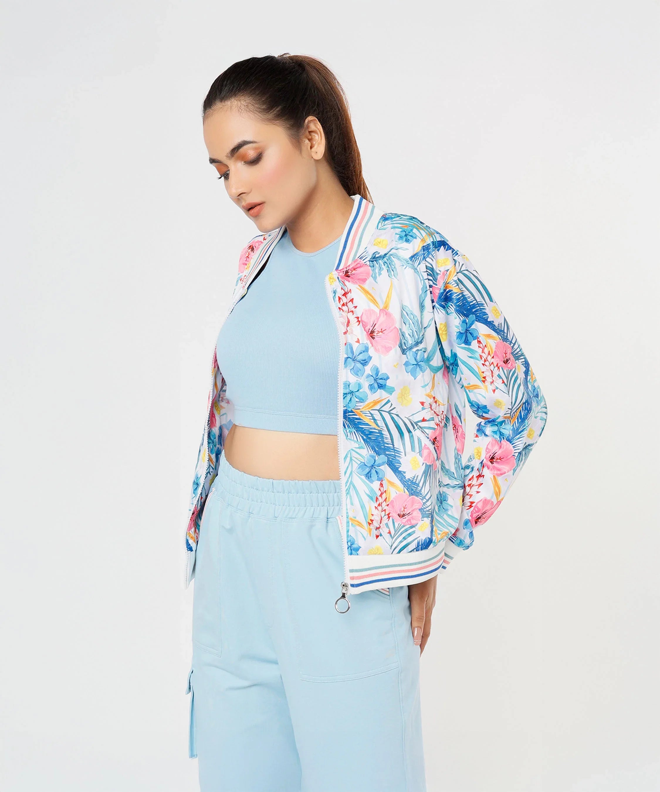 Fashionable stylish co ord sets for women featuring a floral bomber jacket and a blue crop top
