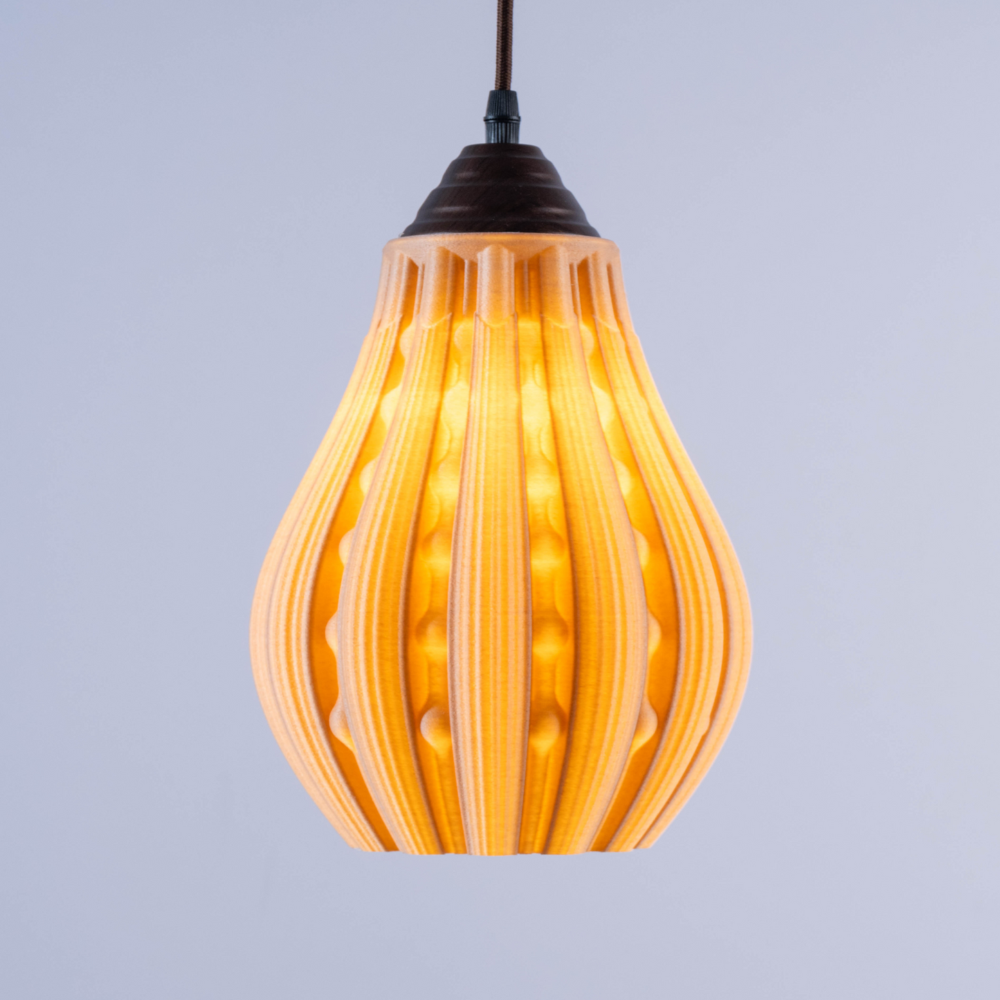 Sozori stylish decorative hanging lamp with a unique ribbed design and warm glow for modern interiors