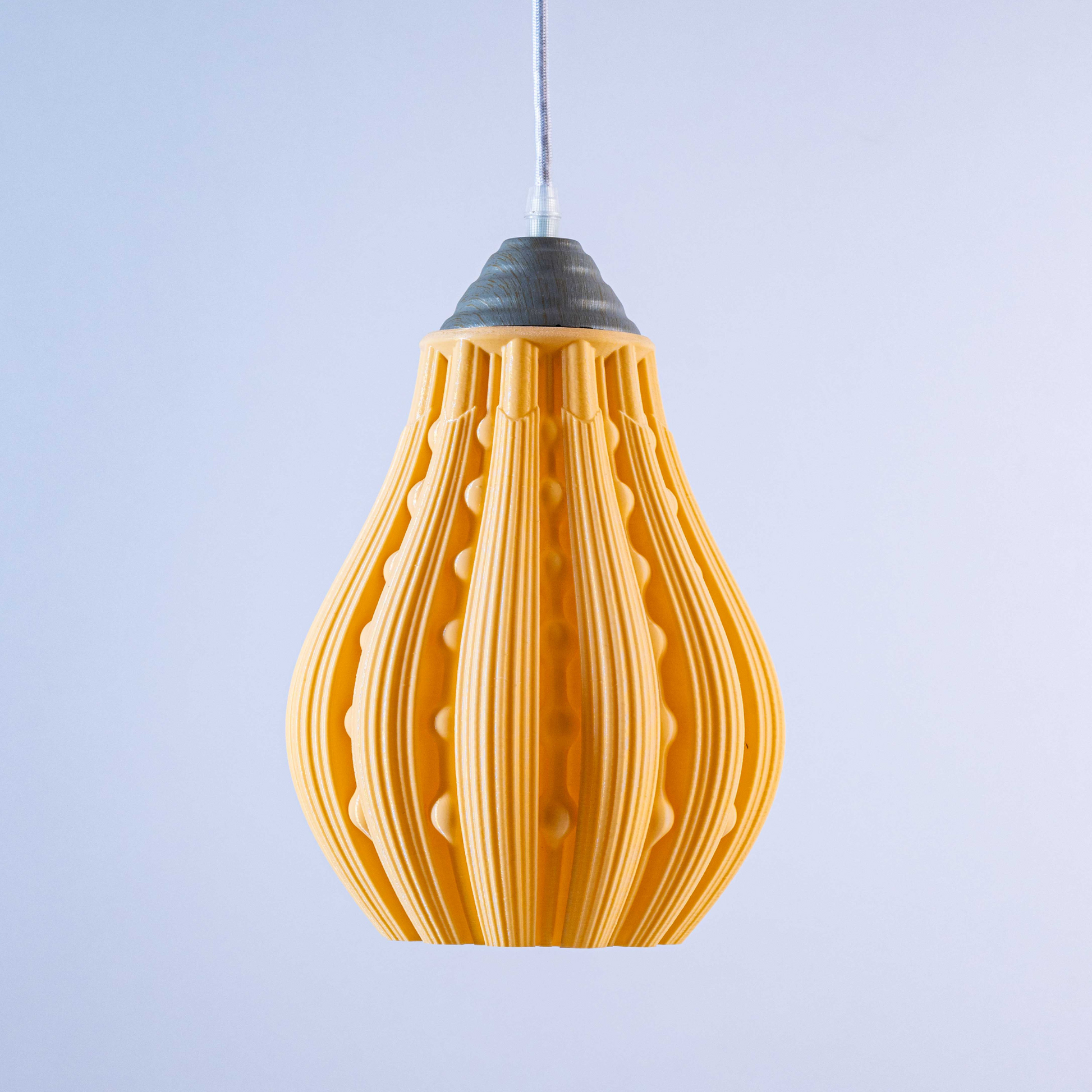 Sozori stylish decorative hanging lamp in contemporary design with a vibrant yellow color