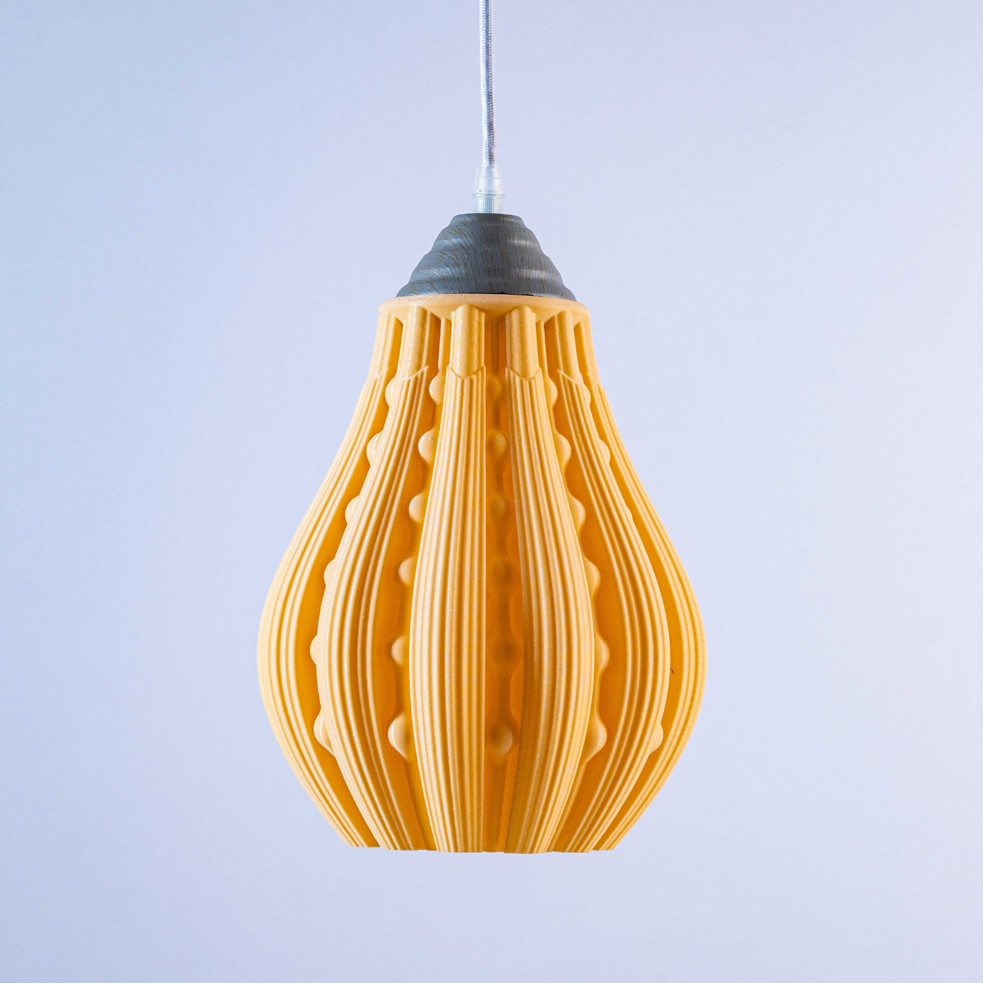 Sozori stylish decorative hanging lamp in contemporary design with a vibrant yellow color