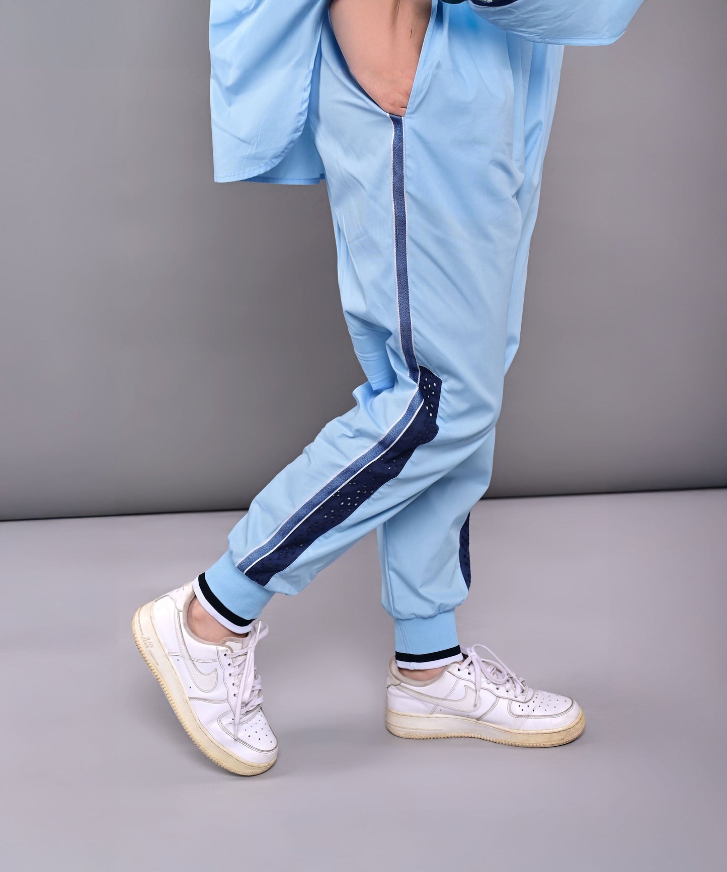 Blue Stylera stylish denim track suit featuring side stripes and comfortable fit