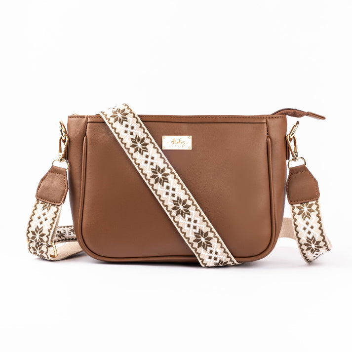 Stylera stylish everyday sling bag in brown with decorative strap for versatile use