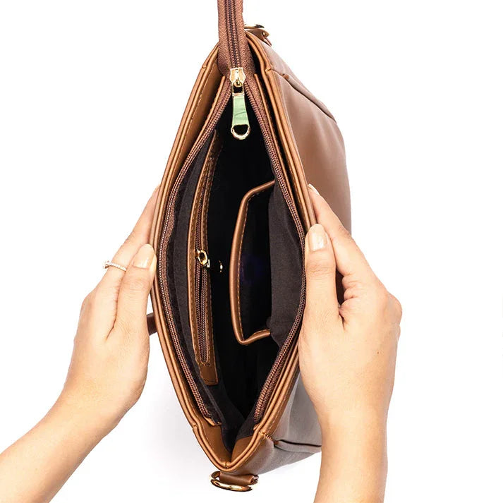 Stylish everyday sling bag by Stylera with interior pockets for organization and easy access