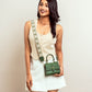 Stylish green purse with gold chain showcased on a model for a trendy look