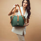 Model holding a stylish leather tote for women by Stylera, showcasing its elegant design